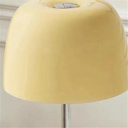 Cream-colored smooth lampshade with subtle glossy finish on decorbites lumiere piccola chrome table lamp for bedside use