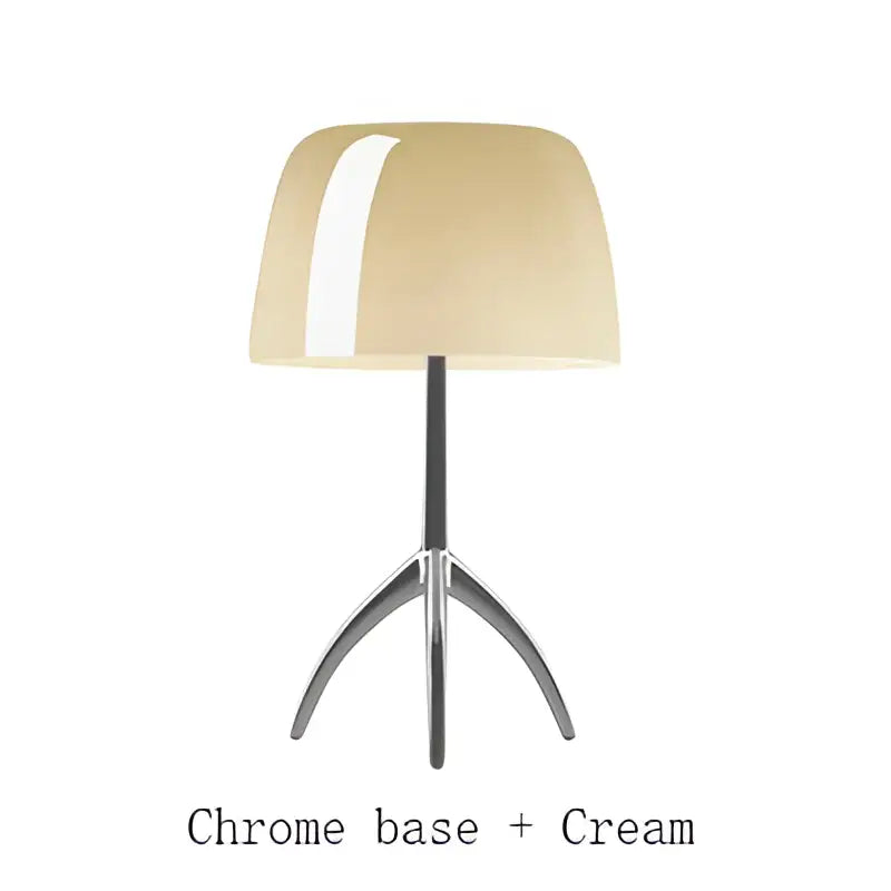 Cream-colored glossy lampshade on a sleek chrome tripod base decorbites lumiere piccola chrome table lamp for bedside use