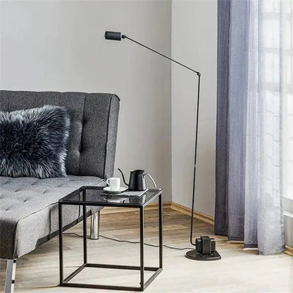 Black metal floor lamp decorbites lumina with sleek minimalist design and adjustable long arm for reading and study room