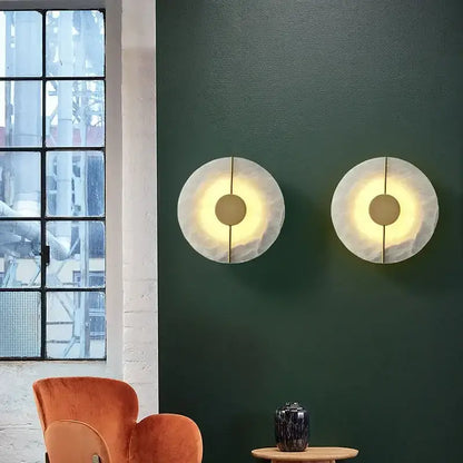 Modern circular decorbites lumind copper wall lamp with matte white textured finish and warm yellow bedside light