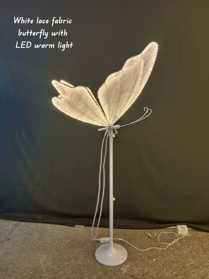 A white lace fabric decorbites luminescent butterfly led floor lamp with warm light for wedding party decor