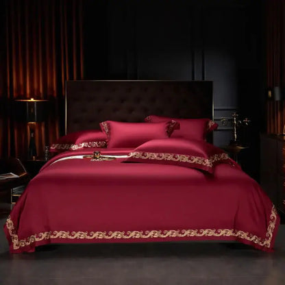 Deep red satin bedding set with intricate luxe gold embroidery by decorbites luxe gold in 1400tc egyptian cotton