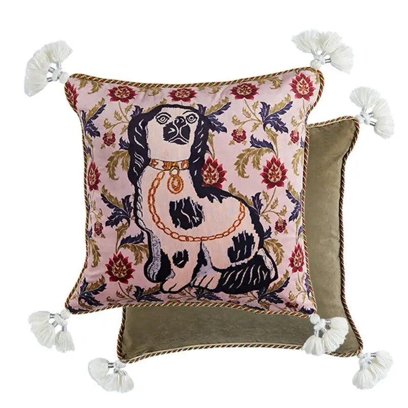 Pink velvet decorative pillow cover featuring an embroidered black and white dog with floral patterns and cream tassels