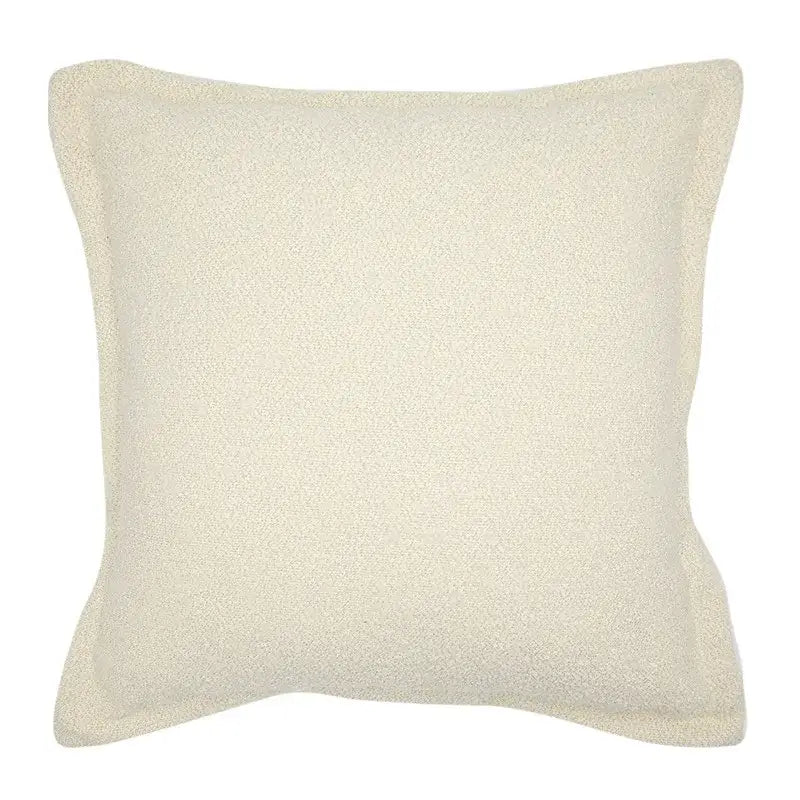 Cream-colored square throw pillow with soft textured fabric finish from decorbites luxe hotel pillowcases collection