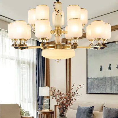 Brass-finished decorbites luxe jade chandelier with frosted glass shades and decorative branch accents for living spaces
