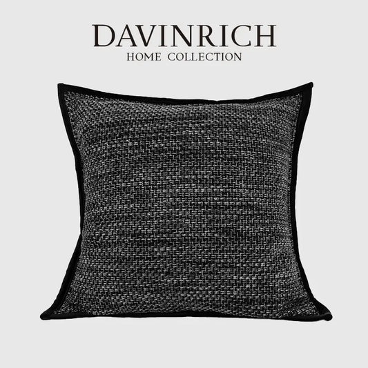 Black textured throw pillow with woven fabric and contrasting trim from decorbites luxe linen blend cushion covers set