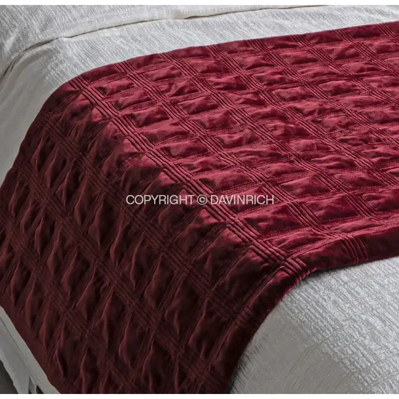 Decorbites luxe linen blend cushion covers in rich burgundy velvet with quilted diamond pattern bed runner design