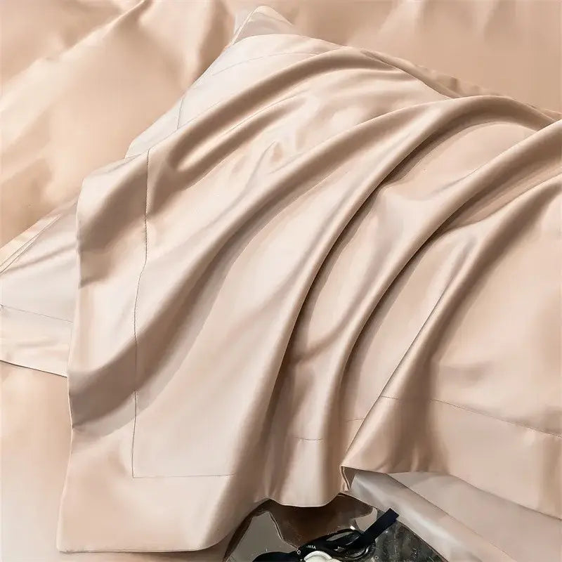 Beige satin pillowcase with a smooth glossy finish and subtle sheen from decorbites luxurious 1000tc egyptian cotton bedding set including duvet cover and fitted sheet
