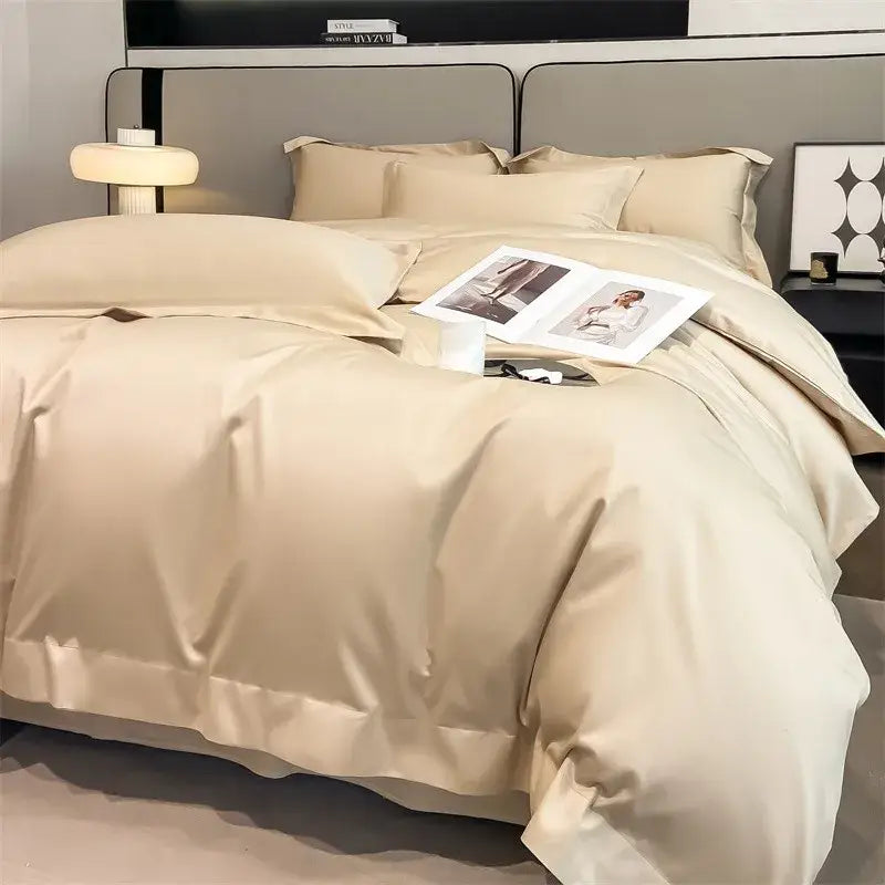 Cream-colored satin duvet cover set with matching pillowcases featuring pleated edges from decorbites™ 1000tc cotton bedding set