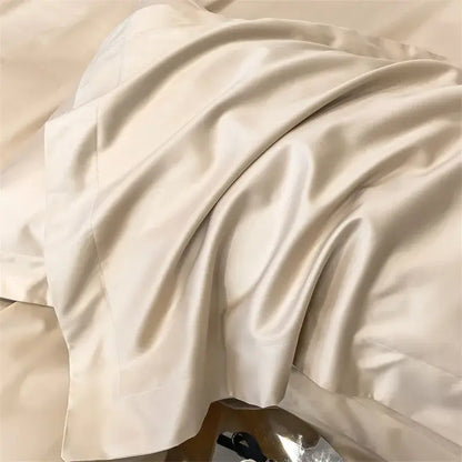 Cream-colored satin pillowcase with a glossy finish and soft folds from decorbites™ luxurious 1000tc egyptian cotton bedding set including duvet cover and fitted sheet