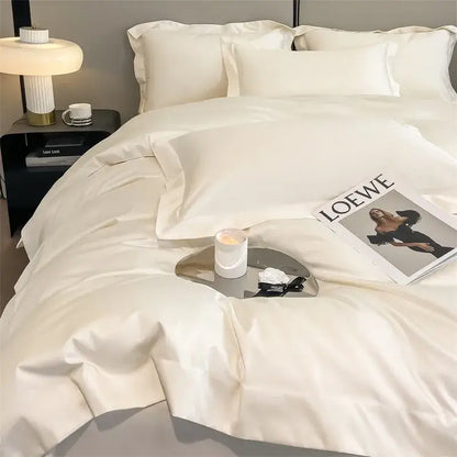 Cream-colored satin duvet cover and fitted sheet set with smooth texture and elegant pleated edges by DecorBites™