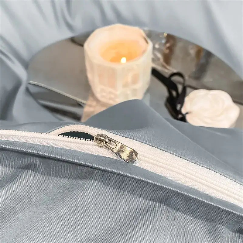 Light blue satin duvet cover with white zipper and metallic pull tab from DecorBites Luxurious 1000TC bedding set