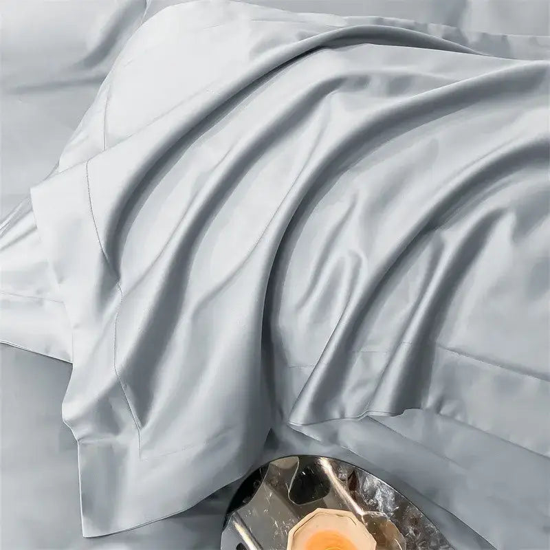 Light gray satin pillowcase with smooth glossy finish and subtle sheen from decorbites luxurious 1000tc egyptian cotton bedding set including duvet cover and fitted sheet