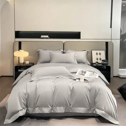 Luxurious silver-gray satin duvet cover and fitted sheet set made from 1000TC Egyptian cotton by DecorBites