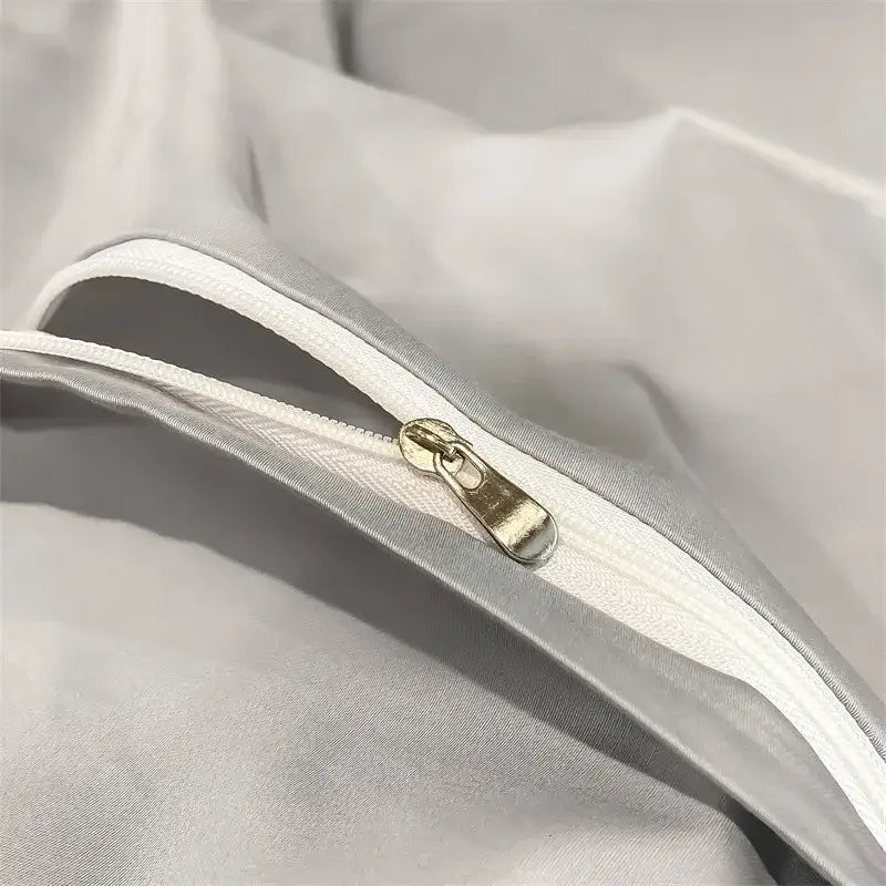 Silver-toned zipper with metallic pull tab on white 1000TC egyptian cotton duvet cover from decorbites luxurious set