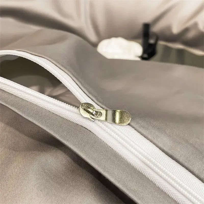 Silver-toned zipper with metallic pull tab on gray egyptian cotton duvet cover from decorbites luxurious bedding set