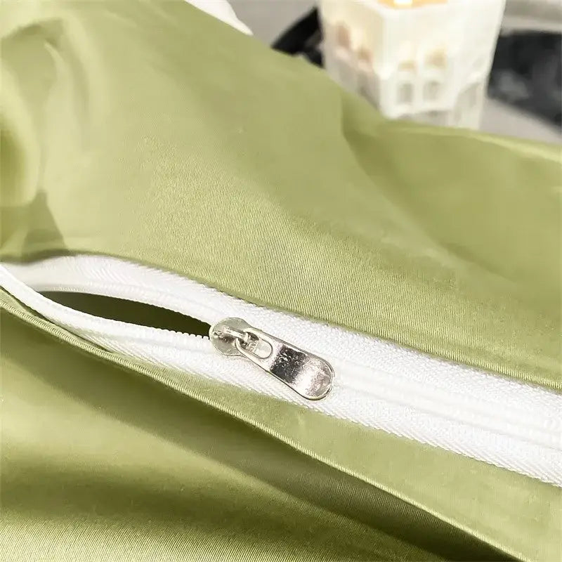 A sleek olive-green satin pillowcase with white zipper from DecorBites™ 1000TC Egyptian cotton bedding set