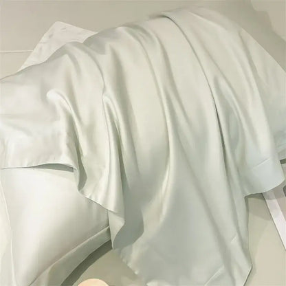 A soft off-white satin pillowcase from the decorbites™ luxurious 1000tc egyptian cotton bedding set with smooth texture