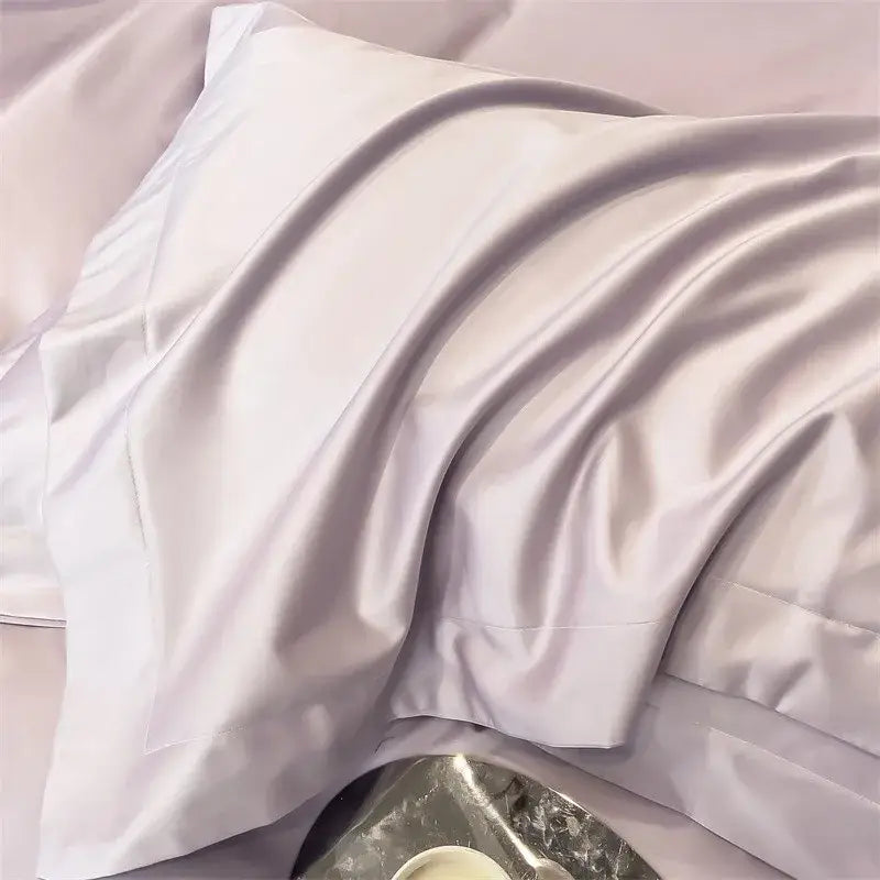 A soft lavender satin pillowcase with a glossy finish from the decorbites luxurious 1000tc egyptian cotton bedding set including duvet cover and fitted sheet