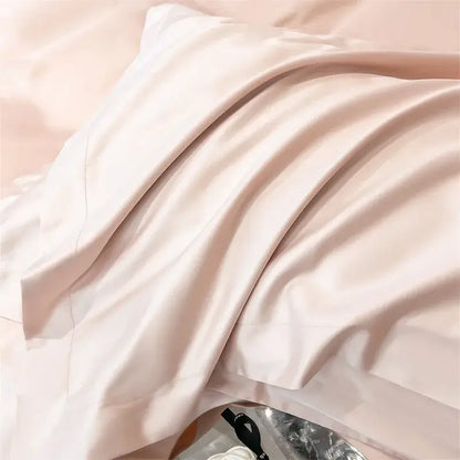 A soft blush pink satin pillowcase with lustrous finish from decorbites™ luxurious 1000tc egyptian cotton bedding set including duvet cover and fitted sheet