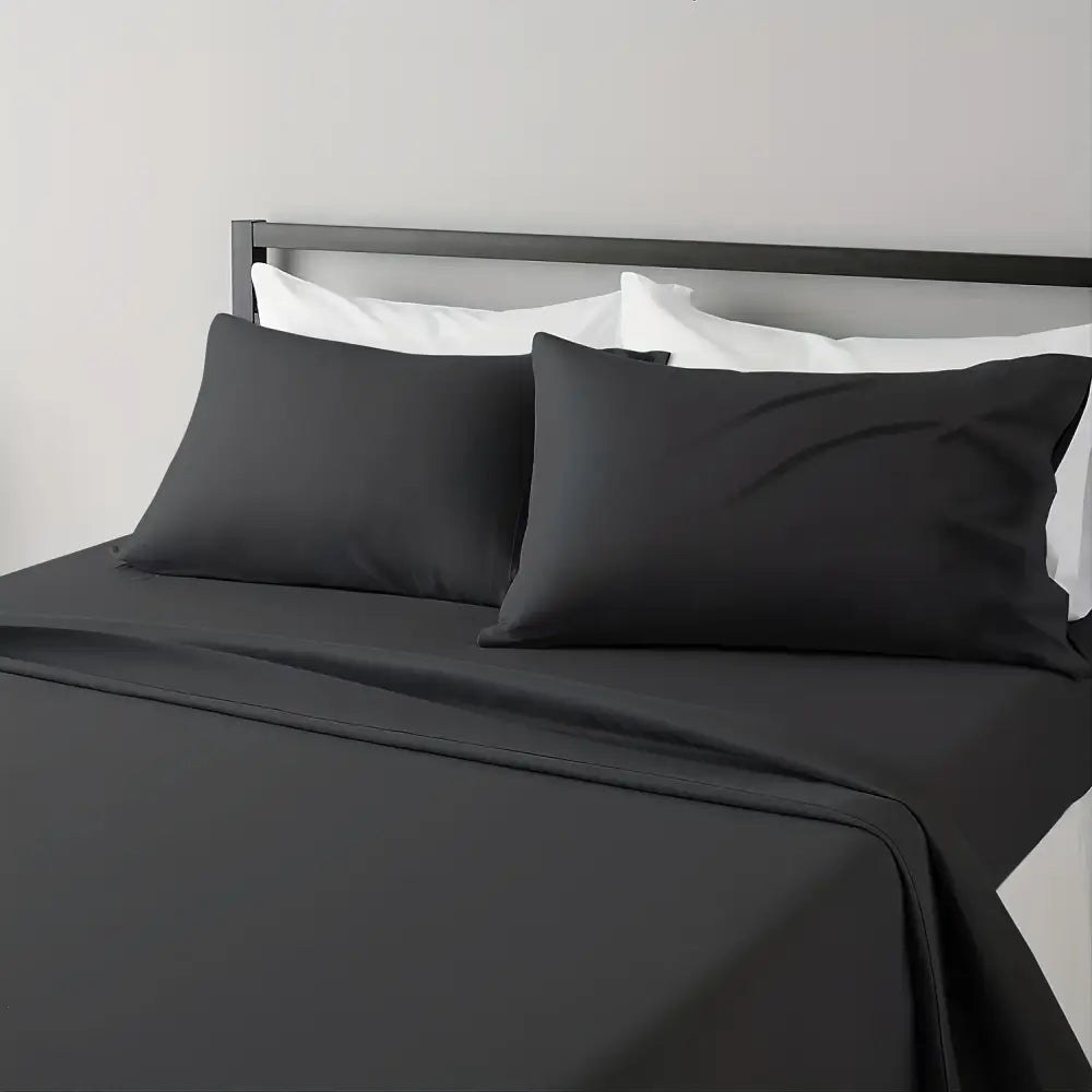 Black satin-like sheet set with smooth glossy finish from DecorBites luxuriously cooling sheet set for breathable comfort