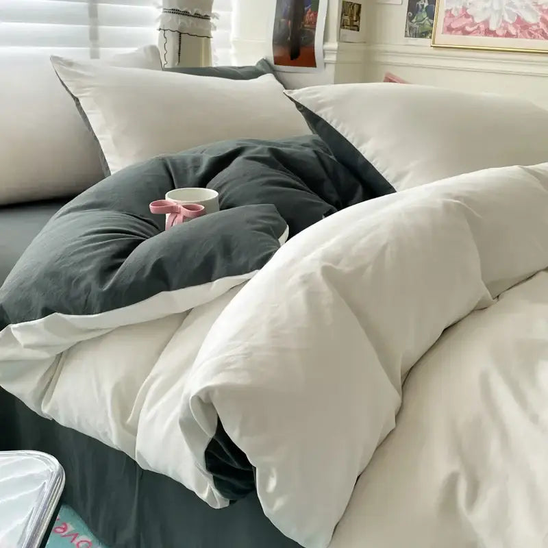 Decorbites™ luxurious cotton bedding set featuring a soft white and charcoal gray duvet cover with a plush texture