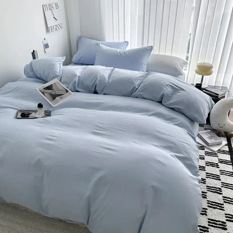 Light blue cotton bedding set from decorbites featuring a soft cozy duvet cover and matching pillowcases