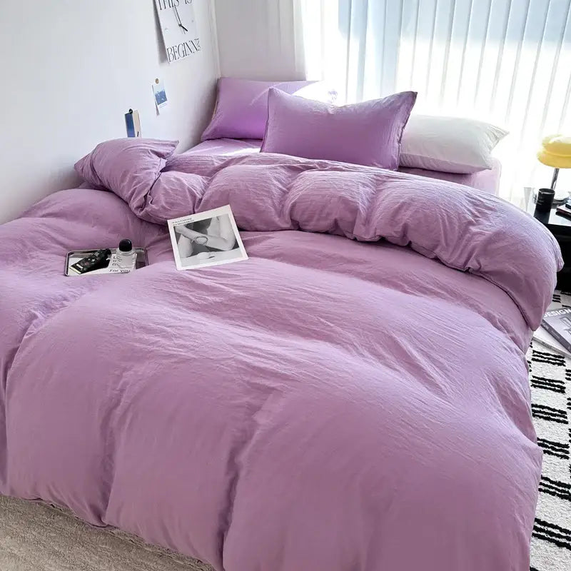 Decorbites™ luxurious cotton bedding set features a plush lavender duvet cover with matching pillows in soft textured fabric
