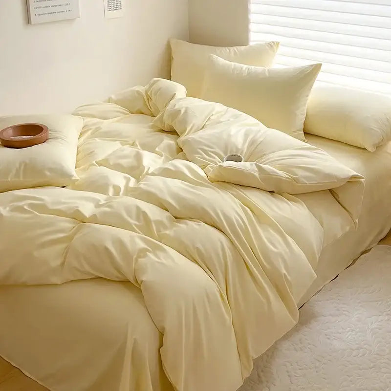 Cream-colored plush quilted comforter with satin-like finish in decorbites™ luxurious cotton bedding set with duvet cover