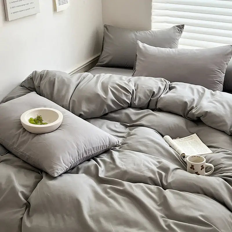Decorbites luxurious gray satin-like cotton bedding set with duvet cover and matching pillows for a cozy bedroom look