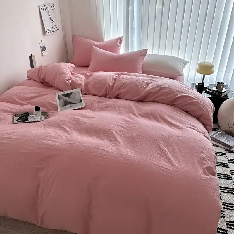 Decorbites™ luxurious cotton bedding set with pink duvet cover and matching pillows featuring a soft textured finish