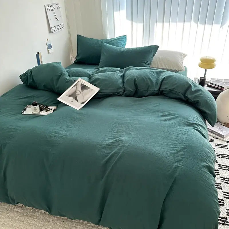 Teal-colored soft textured decorbites™ luxurious cotton bedding set with quilted duvet cover and matching pillowcases
