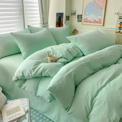 Mint green quilted cotton bedding set with matching duvet cover pillows and bed skirt from DecorBites Luxurious collection