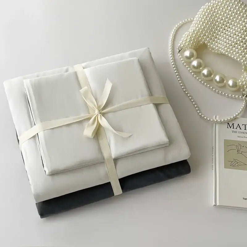Decorbites™ luxurious cotton bedding set with white satin pcs bed sheet tied with cream ribbon and black pillowcase
