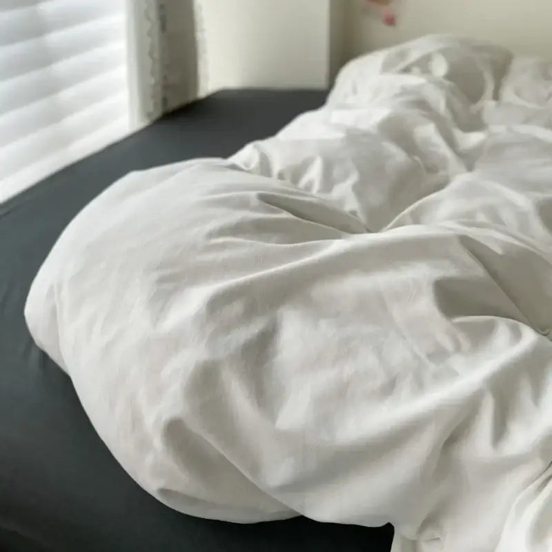 Decorbites luxurious cotton bedding set with a soft white duvet cover and dark pcs bed sheet for added comfort
