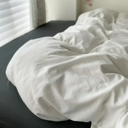 Decorbites luxurious cotton bedding set with a soft white duvet cover and dark pcs bed sheet for added comfort