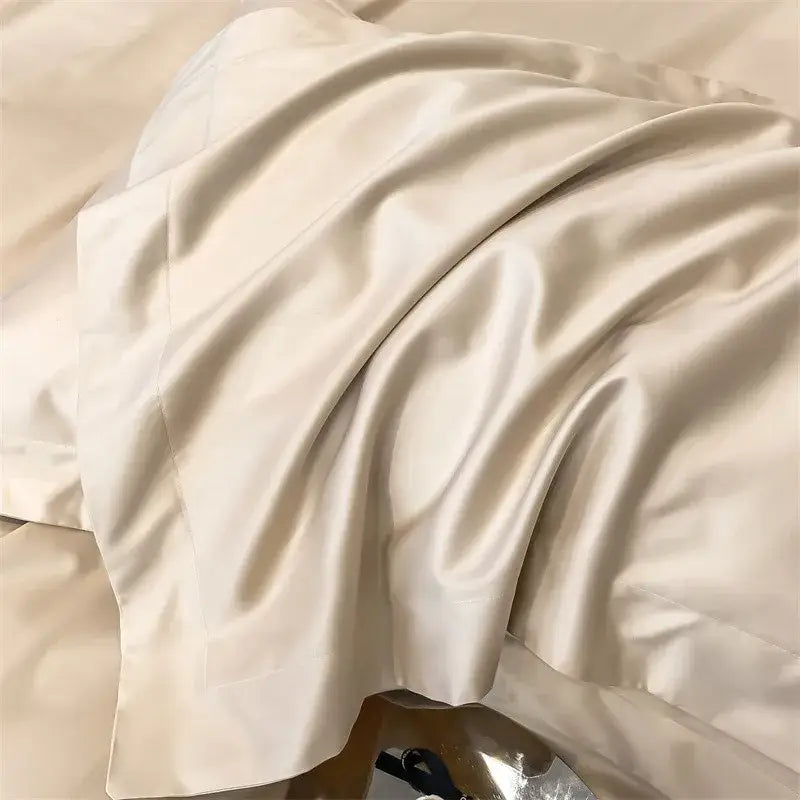 Cream-colored satin pillowcase with smooth glossy finish from decorbites luxurious egyptian cotton bedding set 1000tc includes duvet cover and fitted sheet