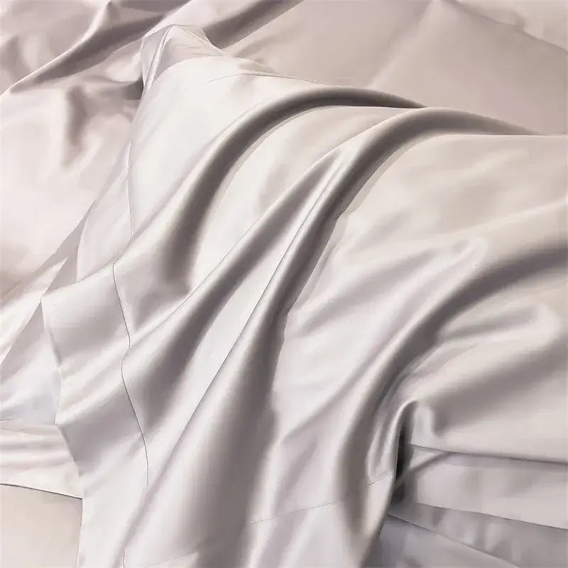A luxurious silver satin fitted sheet with a smooth glossy finish from decorbites™ egyptian cotton bedding set 1000tc