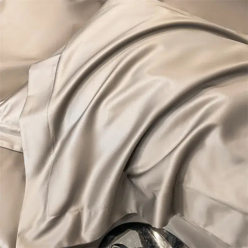 Beige satin pillowcase with smooth glossy texture and subtle sheen from the decorbites duvet cover set 1000tc cotton