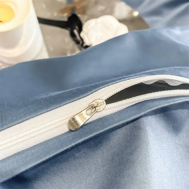 Blue satin duvet cover with white zipper and metallic pull tab from DecorBites™ luxurious Egyptian cotton bedding set 1000TC