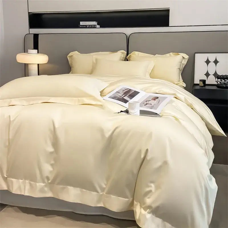 Cream-colored satin duvet cover set with ruffled edges and matching pillowcases from decorbites™ 1000tc cotton bedding set