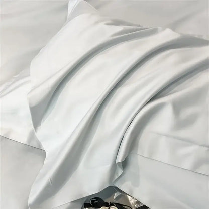 A smooth white satin pillowcase from decorbites™ luxurious egyptian cotton bedding set 1000tc with sheen folds