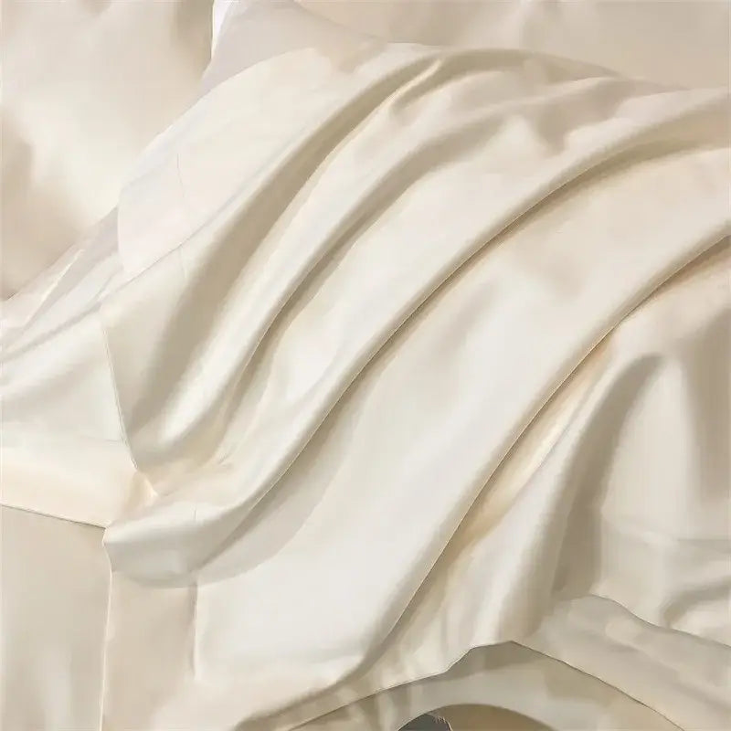 Cream-colored satin fabric with smooth glossy texture and soft folds for decorbites™ luxurious 1000tc duvet cover
