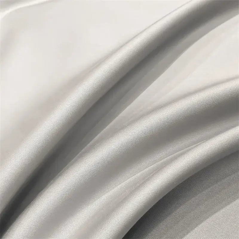 A smooth silvery-gray satin fitted sheet from decorbites™ luxurious egyptian cotton bedding set 1000tc ultra soft