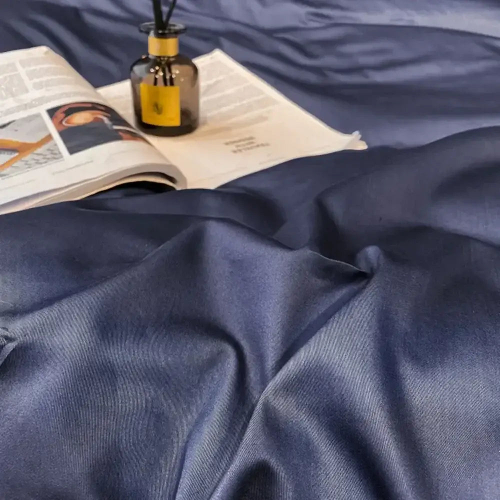 Deep navy satin duvet cover with subtle ribbed texture from decorbites luxurious egyptian cotton bedding set