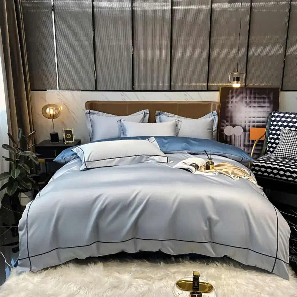 Light blue satin egyptian cotton duvet cover bedding set with black piping trim from DecorBites luxurious collection