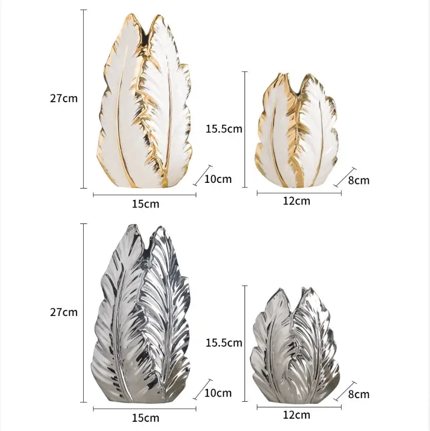 Set of four decorative leaf-shaped luxurious gold ceramic vases in white and metallic finishes for home decor