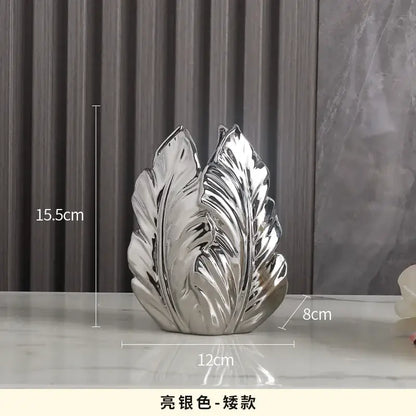 Decorbites™ luxurious gold ceramic leaf-shaped vase with glossy finish and intricate vein details for home decor