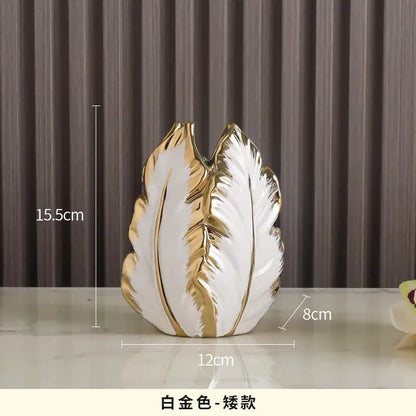 DecorBites™ luxurious gold ceramic vases feature a sleek white and gold leaf design for elegant home decor