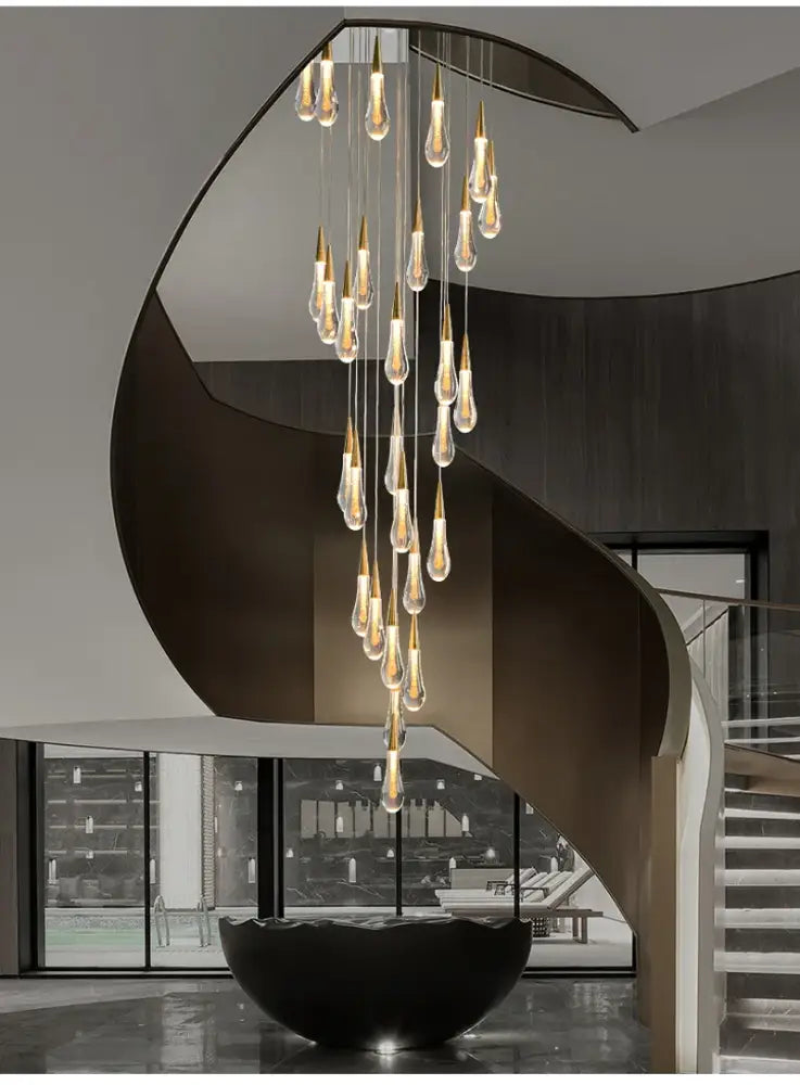 DecorBites™ luxurious gold crystal chandelier with modern crystal light bulbs on curved black frame for staircase lighting